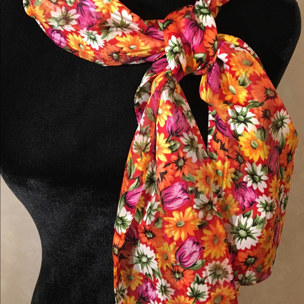 Pretty floral scarf will brighten any outfit